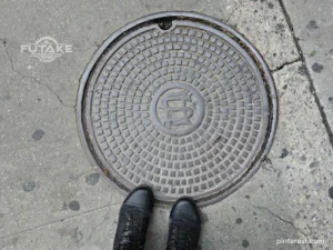 tutup manhole cover besi cor kuat untuk jalan raya lalu lintas berat